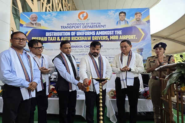 Tripura minister distributes uniforms to taxi, auto drivers to boost tourism