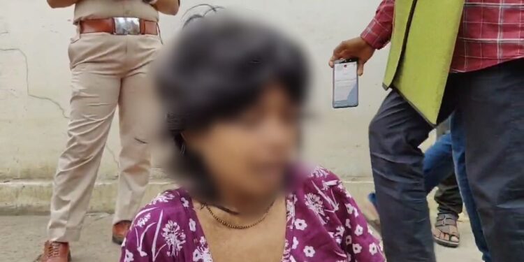 Woman Protests for Justice Amid Financial Struggles