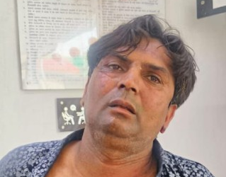 Gujarat Man Attacks Delhi CM Rekha Gupta During Jan Sunvai