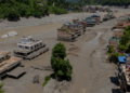 Nepal to bury unidentified bodies recovered after flash floods