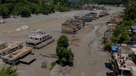Nepal to bury unidentified bodies recovered after flash floods